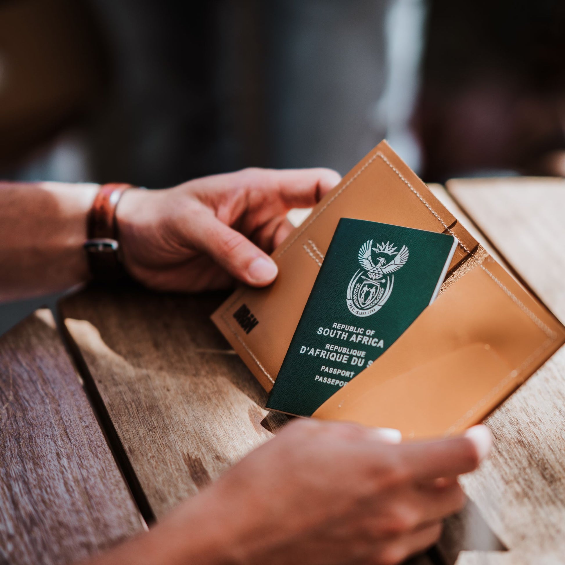 Inside view of leather passport holder and travel wallet.